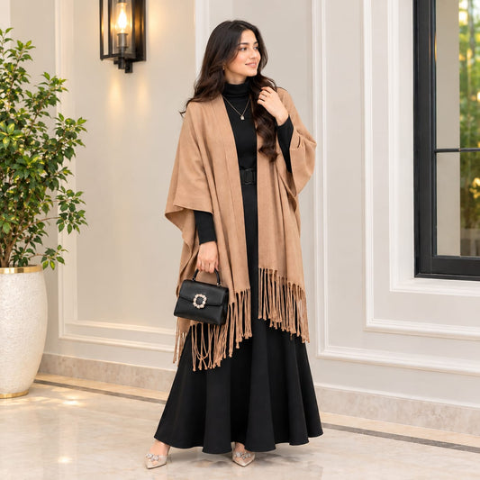 Poncho Look ✨
A timeless blend of sophistication and comfort — perfect for your everyday and formal winter style. 🤎🖤